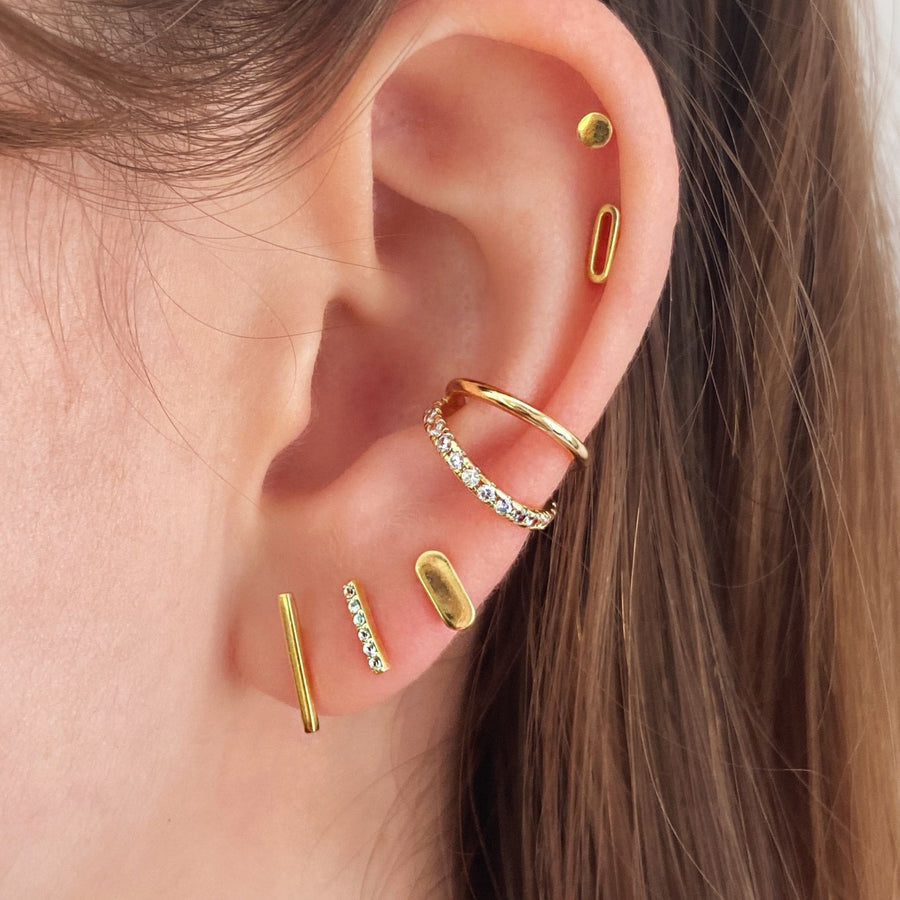minimal ear stack with small gold studs