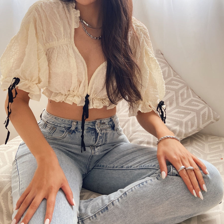 summer top and jeans with silver stacking jewellery
