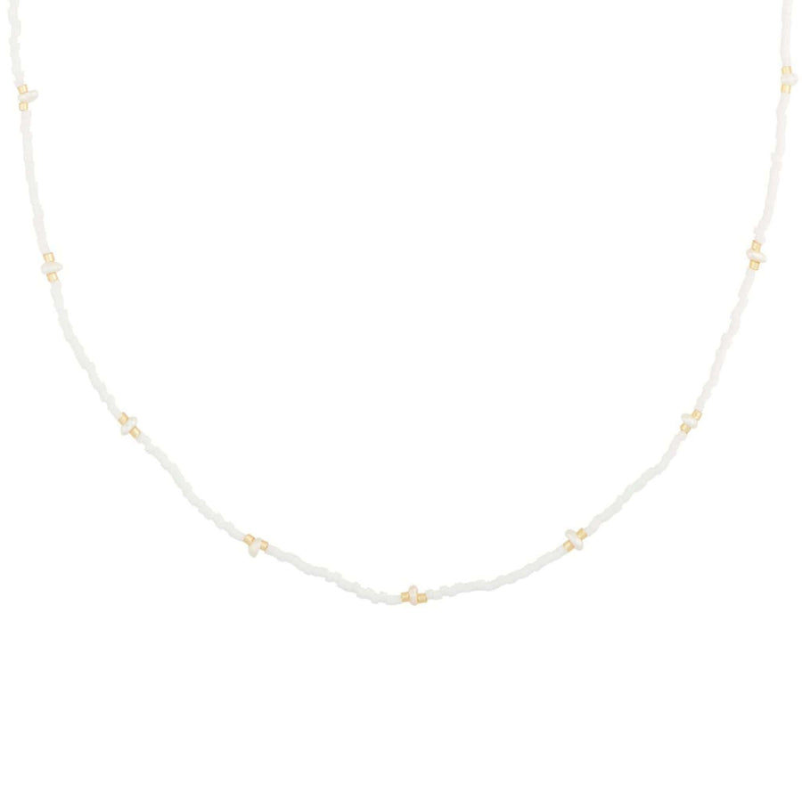 white beaded necklace in gold with tiny pearls