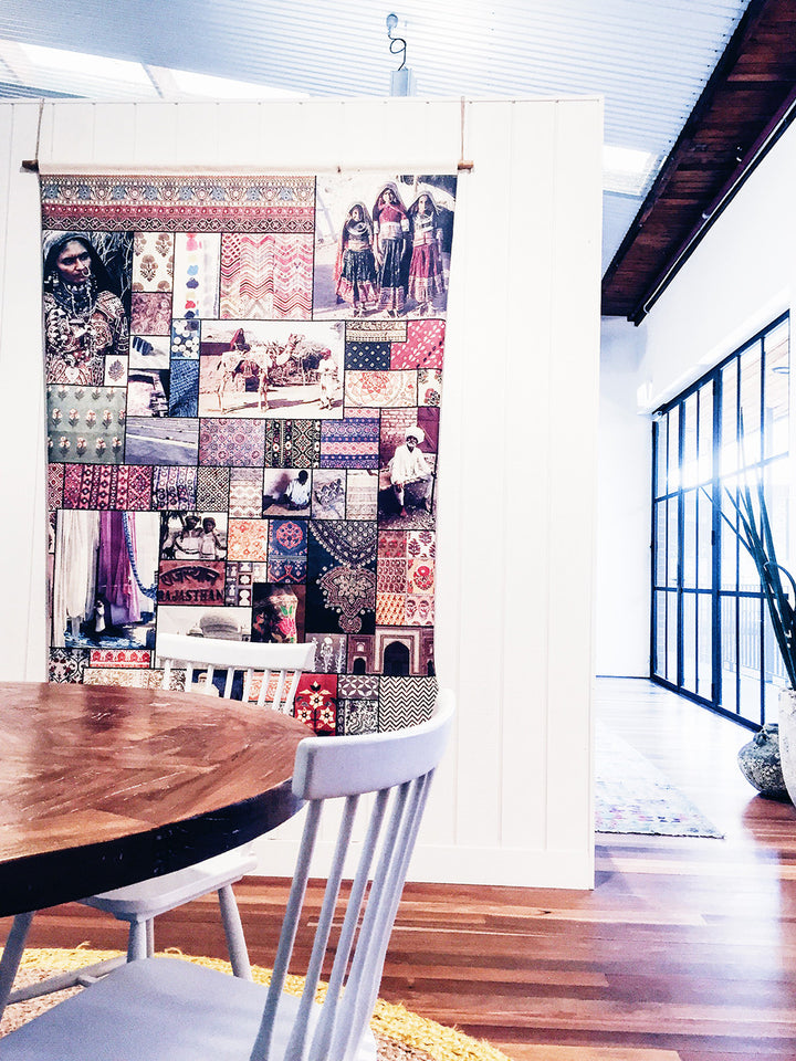 inside look into Tigerlily Swimwear design studio office - inspired by bohemian travels, featuring brightly lit rooms drenched in sunlight, with patchwork tapestry and intricate treasures