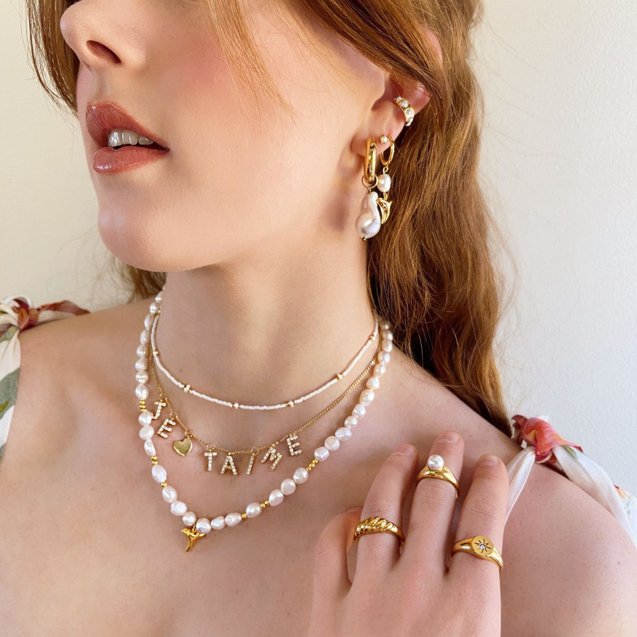 romantic jewellery stack in gold and pearls