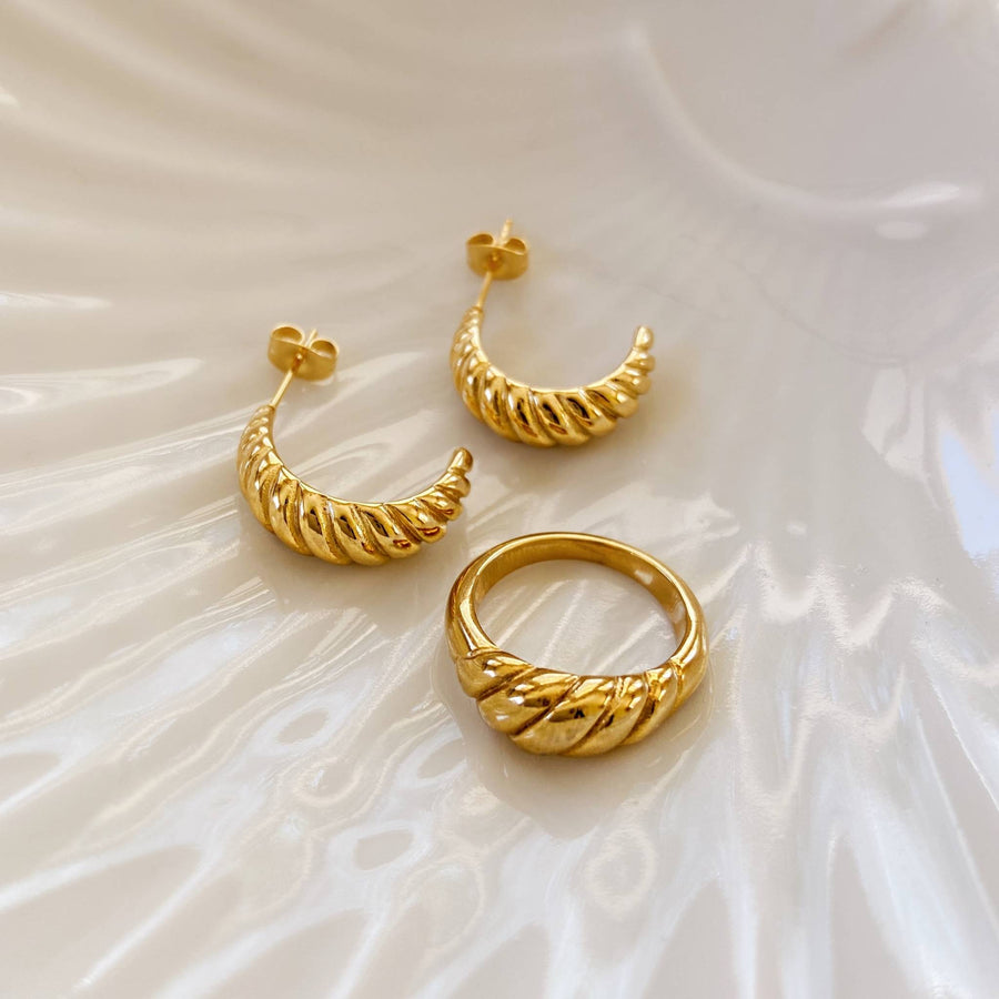 matching set of gold croissant ring and hoop earrings