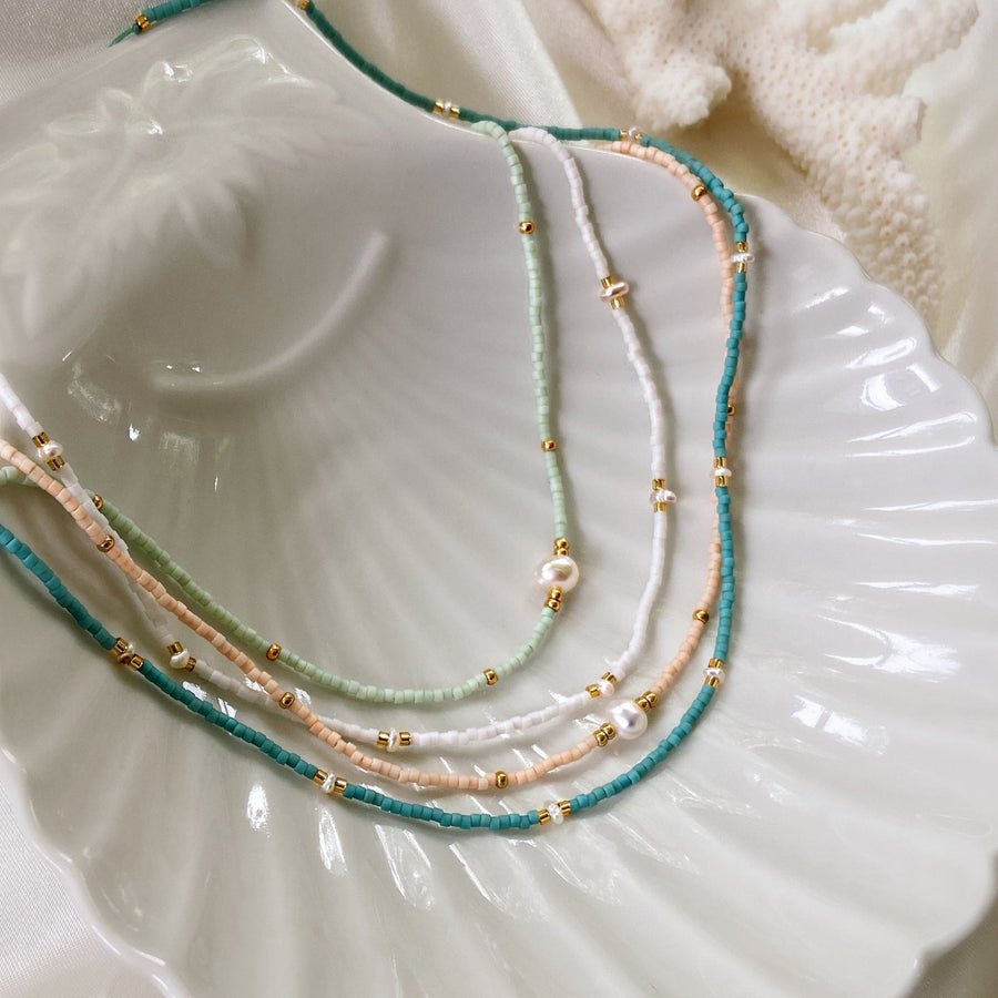 pastel beaded pearl necklaces in blush pin, white, mint and turquoise
