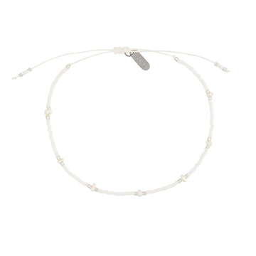 white beaded pearl bracelet in silver